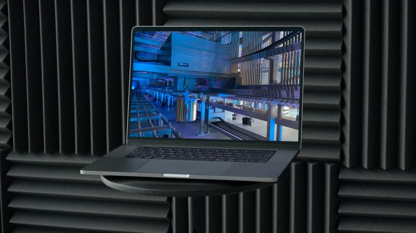 MacBook Pro on the black stool in front of the black background_IMG_3431